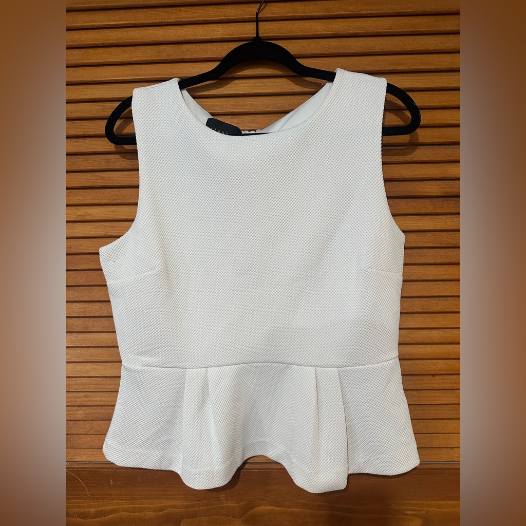 Attention White Textured Peplum Sleeveless Top